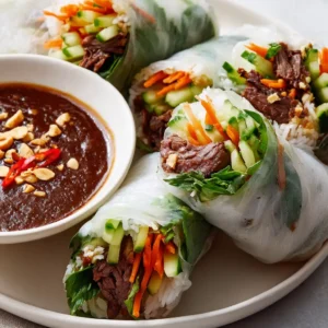 Thai Basil Beef Rolls with Hoisin-Peanut Sauce